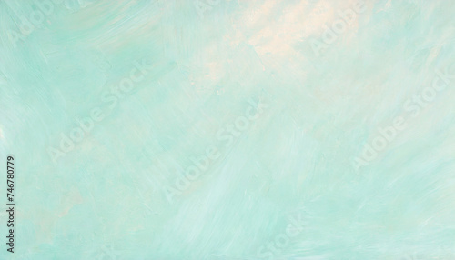 Pale background of light blue, textured with cream tones. Painted plaster surface. Blank backdrop for texture or text copy