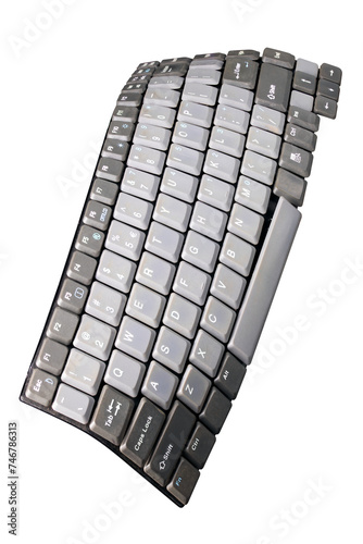 The computer keyboard is bent in an unnatural way. Isolated background.