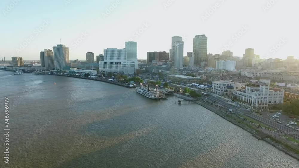 New Orleans Cityscape, Louisiana. City Skyline, Mississippi River and Steamboat Natchez in Background. Sunset Light. Drone New Orleans Cityscape, Louisiana. City Skyline, Mississippi River and Steamboat Natchez in Background. Sunset Light. Drone