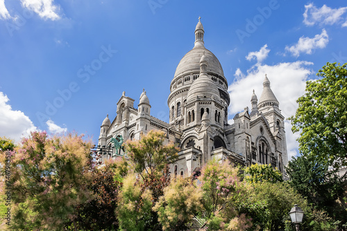 Paris Basilica Sacre Coeur at top of Montmartre - Roman Catholic Church and minor basilica, dedicated to Sacred Heart of Jesus. Paris, France.