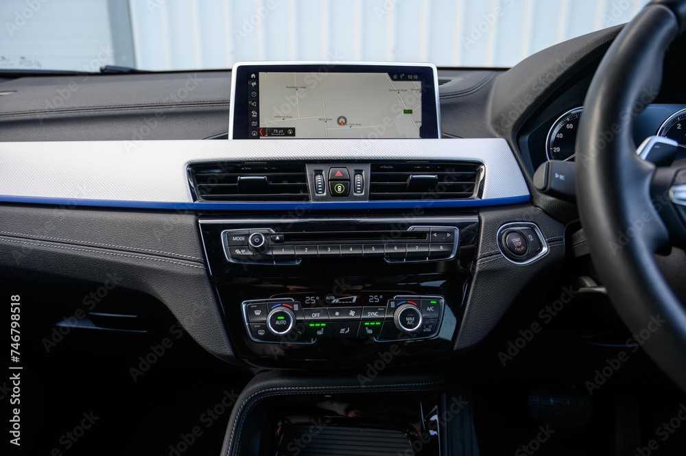 Obraz premium Modern Car Dashboard with Advanced Features, Navigation, A/C