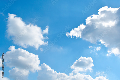 Blue sky with white fluffy cloud. Summer holiday sky. Freedom of life, New life beginning and Positive energy and thought concept. Copy space.