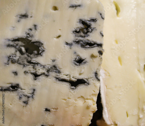 Blue cheese. The concept of an elite salty hard cheese. High quality stock photo.