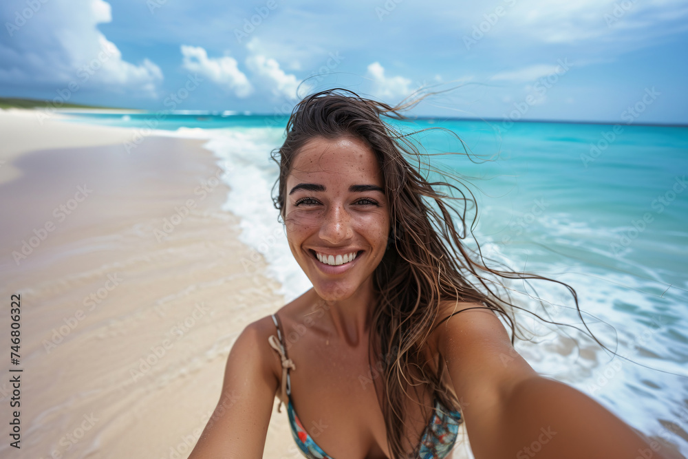 Close-up portrait of a smiling young girl on the beach. Happy girl on summer holiday at the beach. Close-up portrait of a smiling young girl on the beach. Happy girl on summer holiday at the beach.