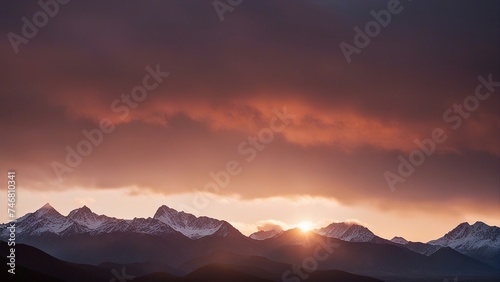 sunset in the mountains mountain range with a sunset behind it  © Jared