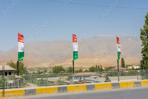 Main road of Panjakent with the Zerafshan Mountains on the background,  Tajikistan photo