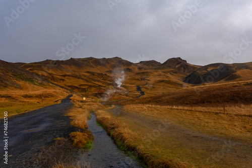 Volcanic landscape of Reykjadalur  steamy valley with natural hot springs   Iceland