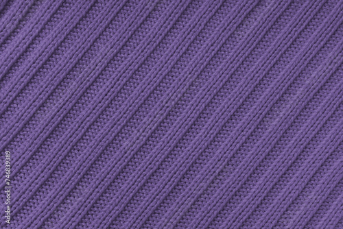 Jersey textile background , purple diagonal striped knitted fabric. Woolen knitwear, sweater, pullover surface texture, textile structure, cloth surface, weaving of knitwear material