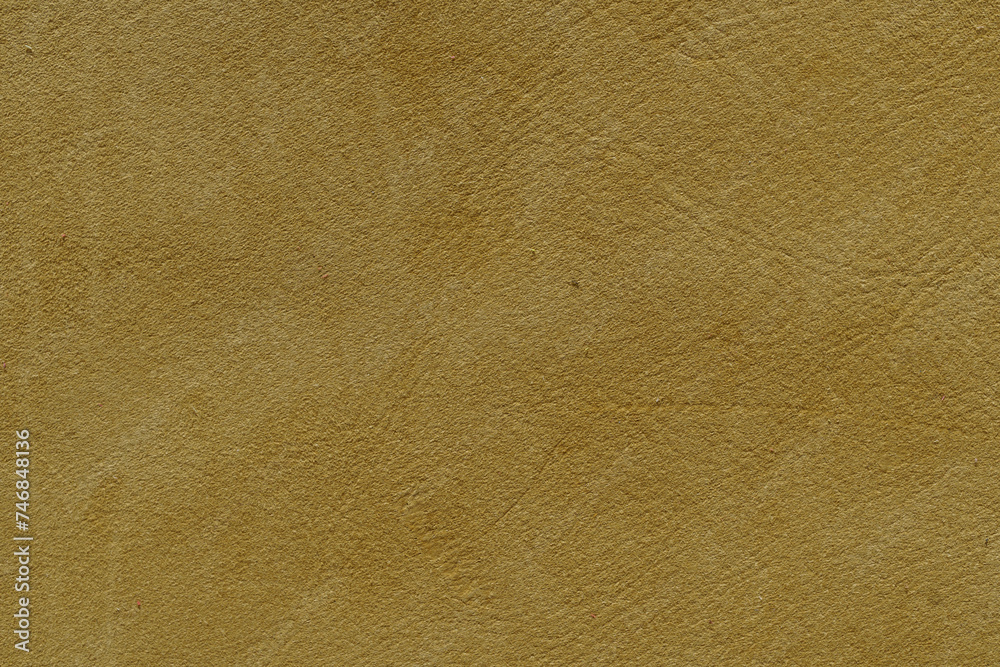 Mustard yellow wall with a subtle texture, a warm and inviting background perfect for design projects. Mustard yellow wall with a subtle texture, a warm and inviting background perfect for design projects.