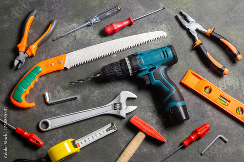 Various repair tools, hardware materials, drill, hammer, pliers, screwdriver, wrench