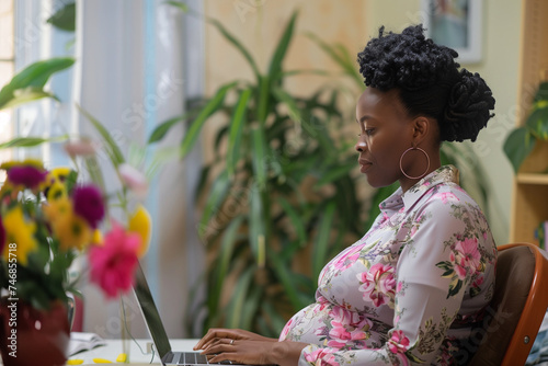 Professional Pregnant Black Woman Working on Laptop Working from Home Remote