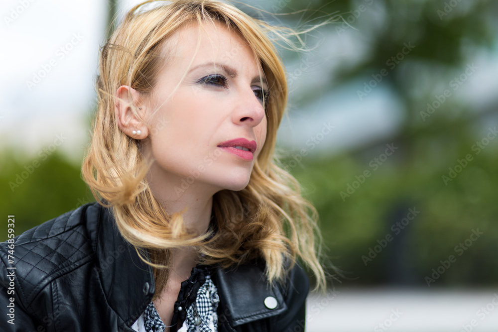 Contemplative woman gazing into the distance Contemplative woman gazing into the distance