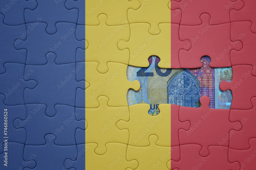 puzzle with the national flag of romania and euro banknote. finance concept puzzle with the national flag of romania and euro banknote. finance concept