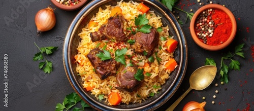 A top view of a traditional Turkish dish called pilaf, featuring spicy flavors of rice, roasted meat, carrots, onions, and parsley.