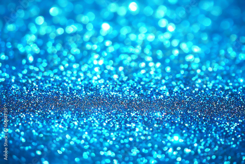 Blue Glittering Particles and Bokeh Background