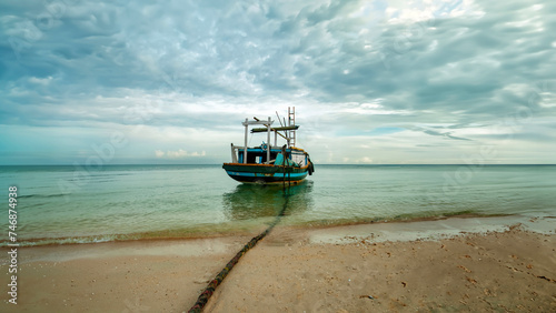 Fototapeta Naklejka Na Ścianę i Meble -  A traditional passenger ship is on the coast of Gili Island, Indonesia