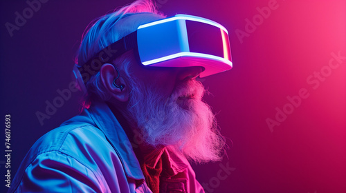 An elderly man wearing virtual reality glasses, immersed in a virtual world, looks fascinated and engaged. Neon light, banner, copy space.
