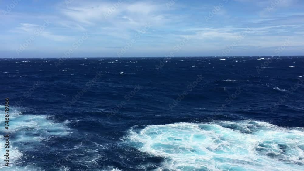 Deep blue ocean during the day with rough seas Deep blue ocean during the day with rough seas