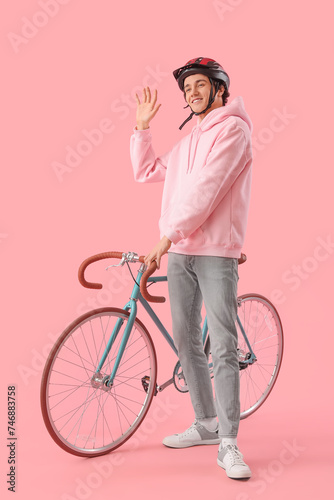 Young man in helmet with bi...