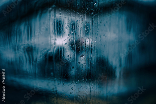 dark blue rainy window photo