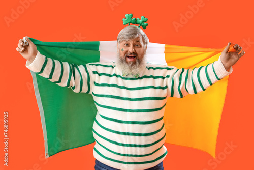 Mature man with Irish flag ...