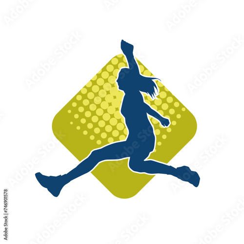 Silhouette of a slim female jump pose. Silhouette of a casual woman jumping