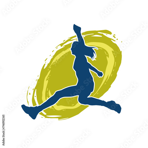 Silhouette of a slim female jump pose. Silhouette of a casual woman jumping