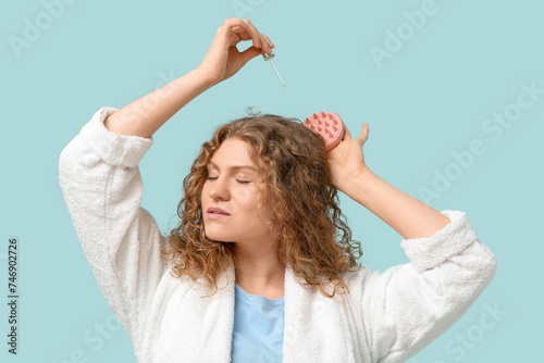 Beautiful young woman using...