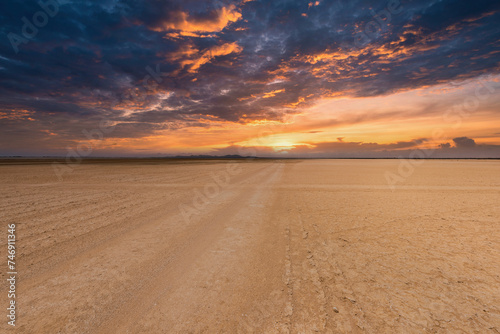 sunset with beautiful orange sky in the carrizales desert. Guajira, Colombia. photo