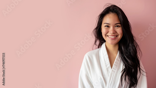 Malay woman in bathrobes, female body care and pampering in hotel spa