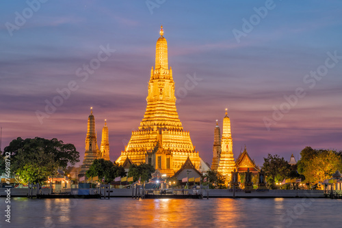 Wat Arun Temple at sunset landmark of Bangkok, Thailand photo