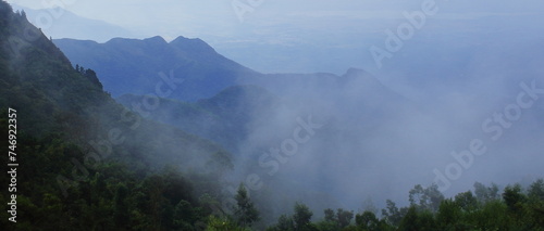 panoramic view of cloudy palani hills, monsoon clouds over mountains at kodaikanal in tamilnadu, the south west monsoon winds bring rainfall in india