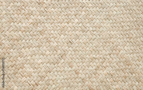 Reed weaving mat texture in natural pattern for background and design art work.