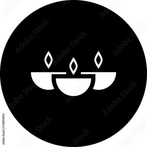 B&W illustration of oil lam (diya) icon.