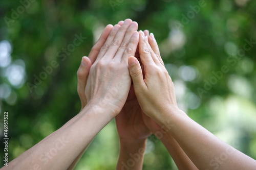 hand up of people working assemble corporate meeting show symbol Join forces teamwork quality and effective personnel Concept organizational development in teamwork and business 