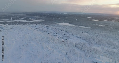 Aerial view around a cabin town on top of a Iso-Syote fell, sunrise in Finland photo