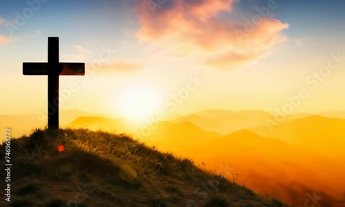 cross in the mountains at sunset holy day 