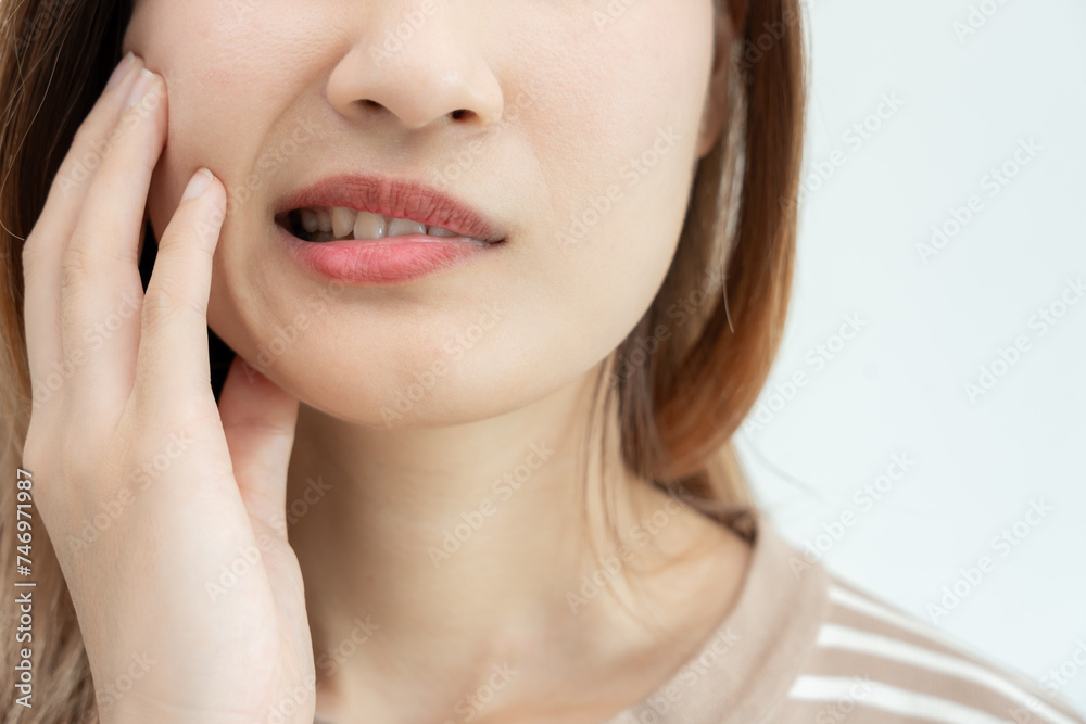 Asian woman feel toothache from gingivitis, female suffer tooth, decay problems, dental care. sensitive tooth, decay problem, bad breath, Gingival Recession, Oral Hygiene instruction, tooth extraction Asian woman feel toothache from gingivitis, female suffer tooth, decay problems, dental care. sensitive tooth, decay problem, bad breath, Gingival Recession, Oral Hygiene instruction, tooth extraction