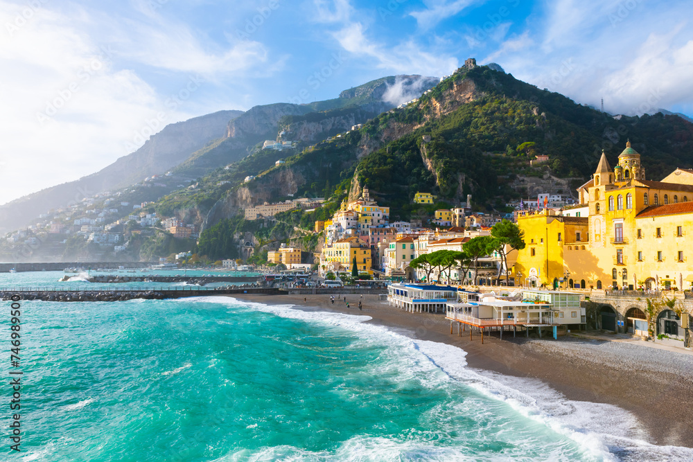 Amalfi coast at sunset, Italy. Beautiful view of Amalfi town with colorful architecture