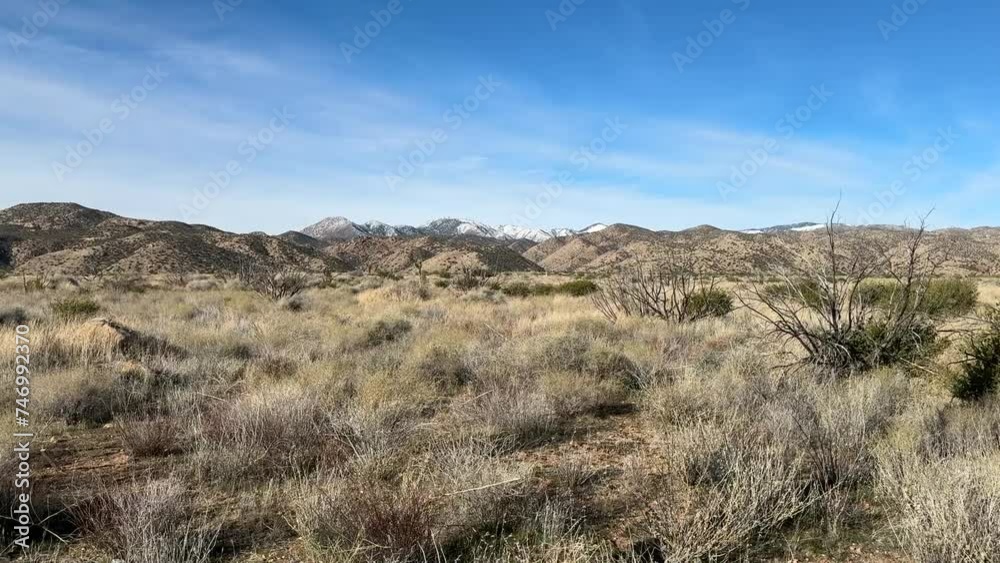 morongo reservation in cabazon california on a clear blue sky day with snow on the mountains in the background tribal land PANNING SHOT morongo reservation in cabazon california on a clear blue sky day with snow on the mountains in the background tribal land PANNING SHOT