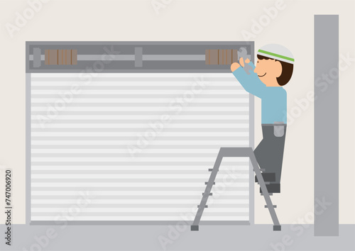 シャッターの修理を行っている人のイメージ素材