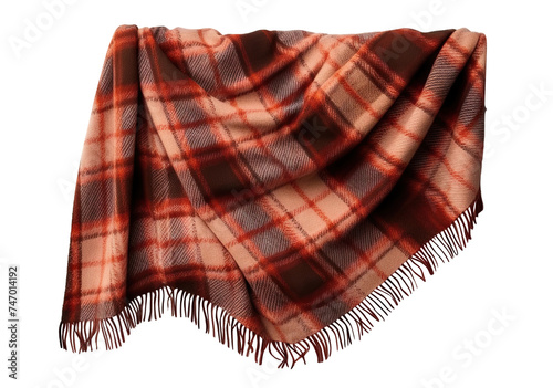 Hanging plaid blanket with fringe draped elegantly, cut out