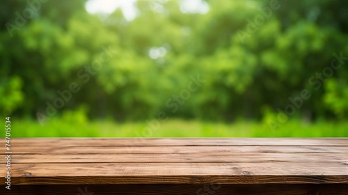 Wooden table with green bokeh background for product display or food photography