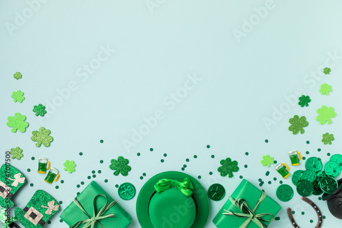 Saint Patrick Day green background with hat, shamrock clover and accessories with gifts top view. Festive greeting card.