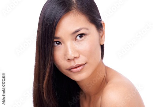 Asian woman, thinking and white background with hair or skin for beauty, model and cosmetics for skincare or routine. Wellness, closeup and natural or healthy face with dermatology isolated in studio