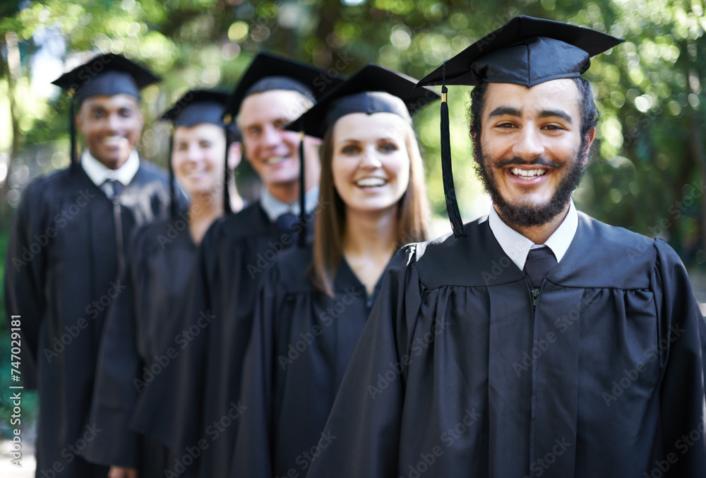 Graduation, university and man for portrait, ceremony and friends for education and college for diploma. Outdoor, degree and celebration for classmates, campus and certificate with cap and gown