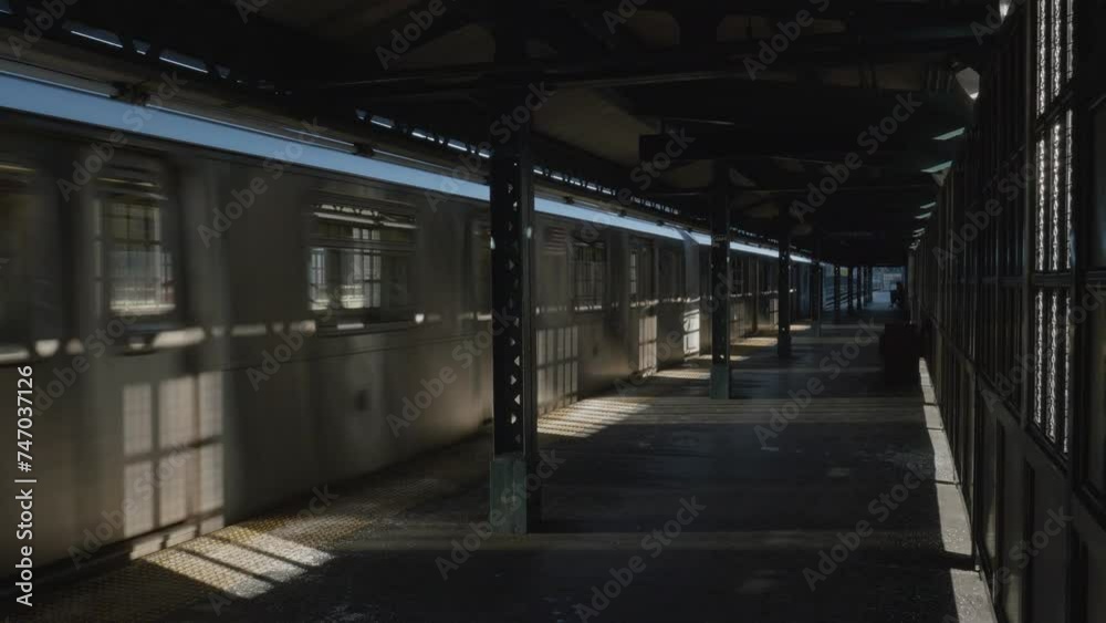 Train arriving at an empty subway station Train arriving at an empty subway station