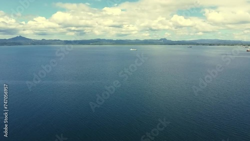 Wallpaper Mural a passenger ship sails on the sea against the backdrop of mountains, aerial view. Torontodigital.ca