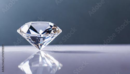 A diamond is displayed on a pure white surface  copyspace on a side