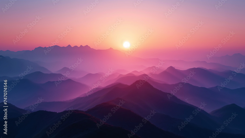 A sunrise over a tranquil mountain range